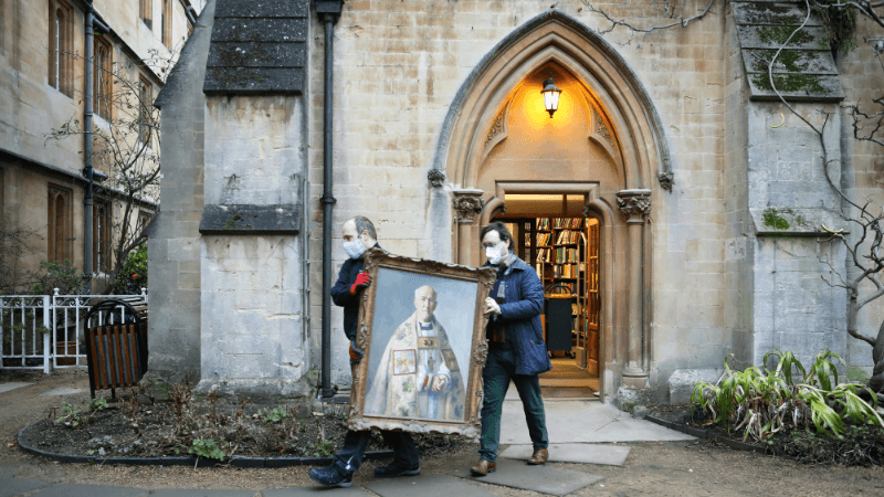 Artwork being removed from the Library for restoration and cleaning. 